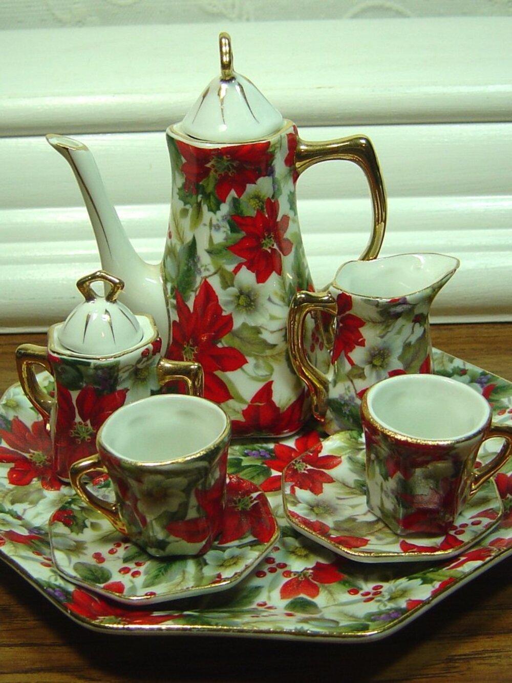 Tiny porcelain 10 piece tea set by Formalities-Baum Bros. poinsettia pattern